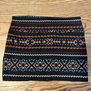 Forever21 - size medium, multi-colour patterned over black, mini skirt.